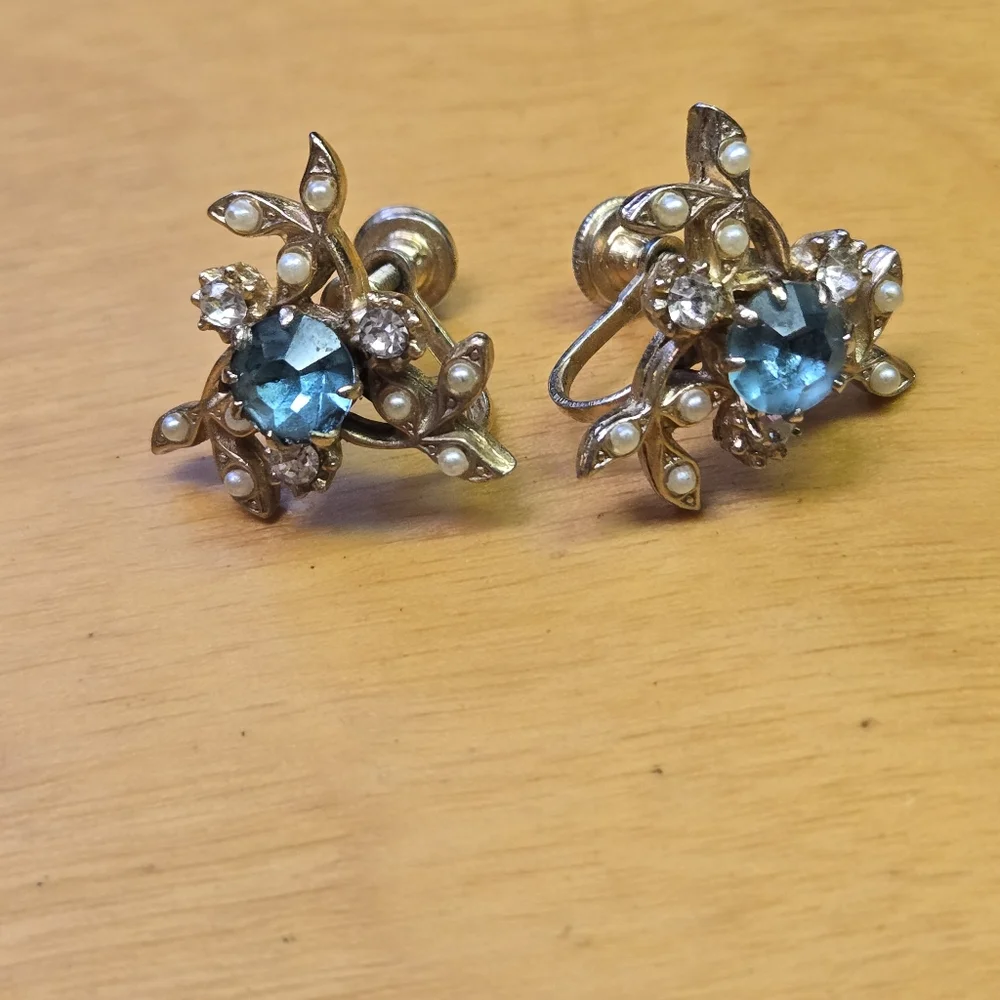 Vintage clip on gold tone earrings with faux pearl accents